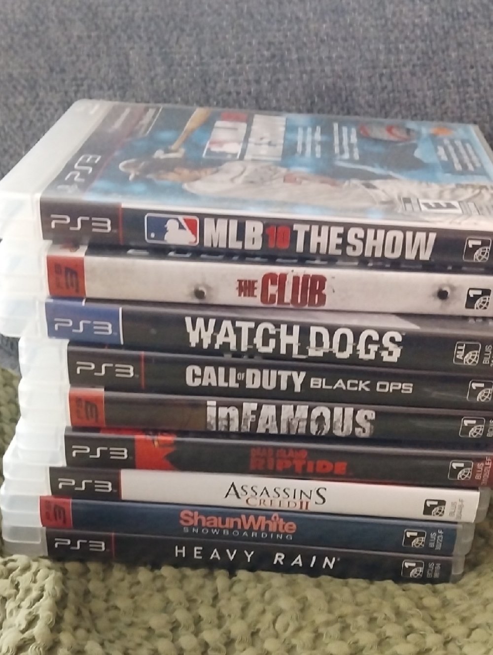 Sony PS3 Game Stack with Black, White, Red, Blue Accents